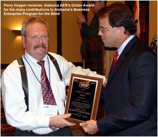 Perry Hooper receives Alabama AER's Grider Award.